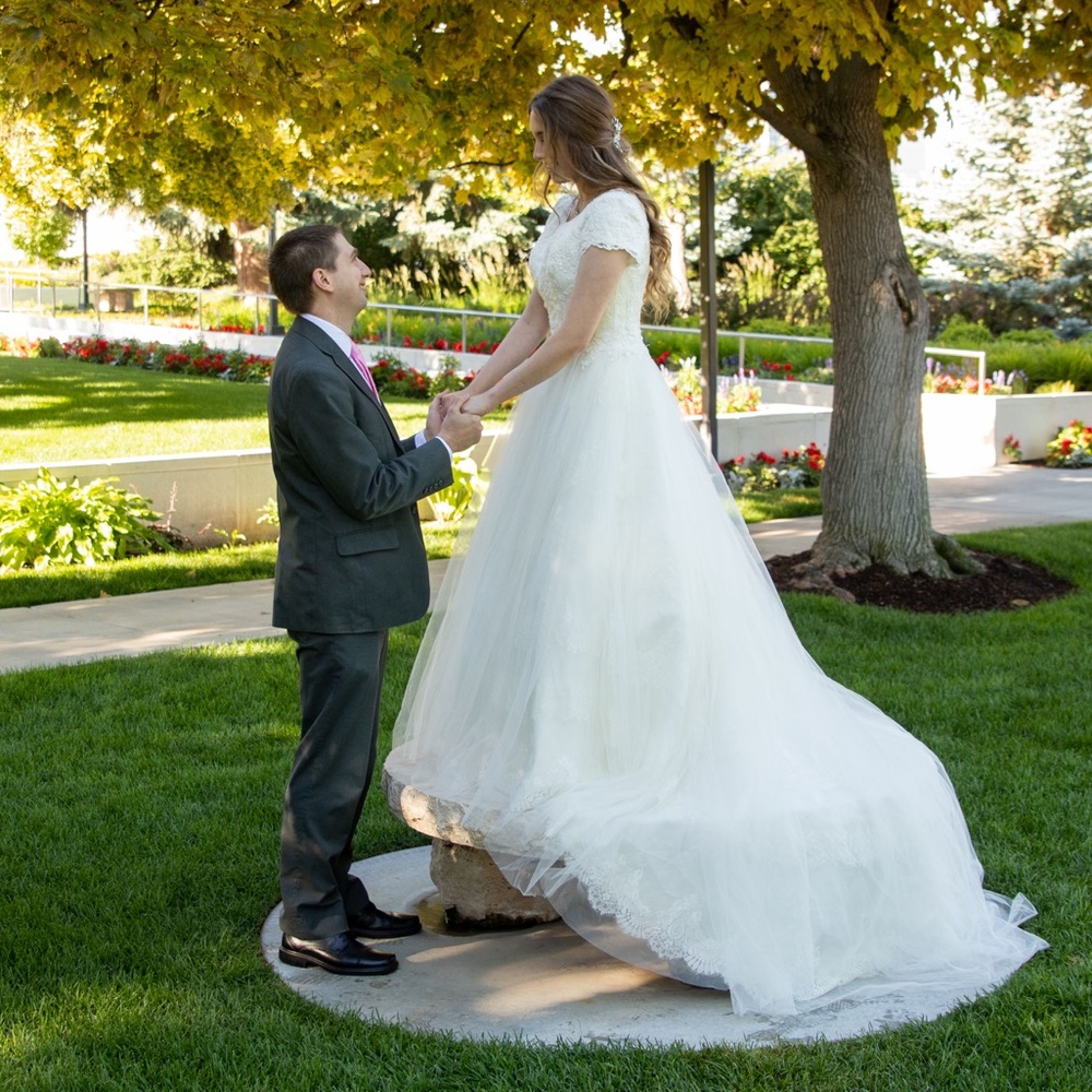 Bliss wedding dress, lightly used, like new. Professionally dry cleaned.